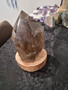 Smokey Quartz Properties: It is considered a premier grounding stone that helps balance the root chakra, promoting stability, security, and emotional balance. It is believed to help neutralize negative energy, alleviate fear, and reduce stress
Protection & Detoxification: Often used as a shield against electromagnetic smog (EMF) and geopathic stress. It is also believed to aid in letting go of old, negative patterns.