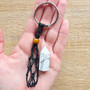 Amethyst Keychains have an easy open clasp that securely holds onto any bag or accessory you attach it to. Black macrame cotton surrounds and holds your Amethyst Point, protecting it from rough surfaces. You can remove your Amethyst Point from the pouch to hold in the palm with the point facing inwards, during meditations. 

2 for $19 at cart

This is Brazilian Amethyst which encourages the holder to relax, clear their thoughts and focus on their own intuition. As a stress relieving stone you can also keep this under your pillow for a peaceful sleep or to soothe headaches and migraines. If you have OCD, ADD or ADHD Amethyst Energy is for you!