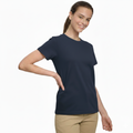 Young woman smiling, wearing a navy 100% cotton semi-fitted short sleeve t-shirt, perfect for custom printing or casual wear.