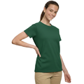 Young woman smiling, wearing a kelly green 100% cotton semi-fitted short sleeve t-shirt, perfect for custom printing or casual wear.