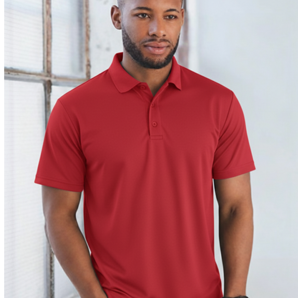 Male model wearing a red plain CoolDry short sleeve polyester polo shirt (PS81)