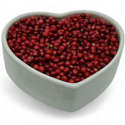 Heart-Shaped Bowl of Pink Peppercorns
A heart-shaped bowl filled with vibrant whole pink peppercorns, showcasing their bright color and premium quality.