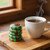 Chocolate Starlight Mints paired with coffee and tea for an after-dinner treat or relaxing break. Individually wrapped chocolate mint hard candies with rich chocolate flavor and refreshing mint taste.