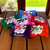 Four brightly colored Zotz candy packs displayed on a wooden surface, showcasing variety and freshness.