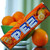 PEZ Orange candy refill pack with bright orange packaging and citrus imagery, classic fruit-flavored pressed candy refills for PEZ dispensers.
