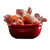 Red bowl filled with individually wrapped Chick-O-Sticks, viewed from above.