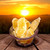 Glass bowl filled with sun-dried crystallized ginger pieces photographed with warm lighting to highlight color and texture.