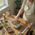 A cook working with fresh Rainbow Peppercorns, highlighting their everyday use in home kitchens and gourmet recipes alike.