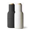 AUDO (ex Menu) Bottle Grinder Set — carbon and ash with beechwood lid, side-by-side product shot.