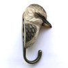 Side profile of a decorative Kookaburra hook showing the detailed carving of the feathers and the bronze-finish metal hook.