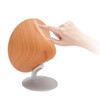 Hand manipulating GINGKO Mini Halo One Bluetooth Speaker Beech
