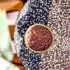 Novelty candle that looks like a can of coffee beans
