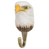 Three-quarter view of a hand-painted Bald Eagle wooden hook, highlighting the artisanal textural details of the feathers and the regal expression.