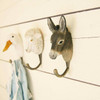 WILDLIFE GARDEN Wall hooks mounted on wall.