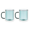 Leaf & Bean's double-walled glass mug set features verdigris insides, rims, and handles, available at 'the design gift shop'.