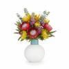 Handcrafted  sculptural bulb shaped vase, filled with a colourful flower bouquet.