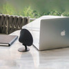 GINGKO Mini Halo One Bluetooth Speaker Matt Black beside silver laptop | the design gift shop