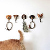 A row of five different hand-carved dog breed wall hooks, including a Golden Retriever, holding collars and keys. Only the Golden Retriever is part of the offer.