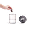 Somebody adding essential oil to the gunmetal Lexon Horizon Aromatherapy Diffuser