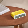 LEXON Flip Classic X Pantone Mimosa LCD alarm clock on table