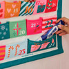 Close-up of double-size pockets for 23rd & 24th on Annabel Trends Advent calendar.