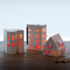 Three MoMA Casagami Solar Nightlights.