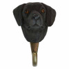 Head-on view of the hand-painted Black Labrador hook, focusing on the dog’s friendly, attentive expression and the hand-carved finish.
