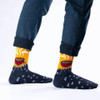 Person wearing SEXY SOCKS BBQ bamboo socks styled with cuffed blue jeans.