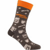 Side profile view of the SEXY SOCKS Expresso Yourself bamboo sock with bright orange ribbed cuff and coffee pattern.