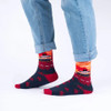 Person wearing SEXY SOCKS Nomads bamboo socks styled with cuffed light-wash denim jeans.