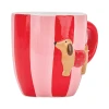 Close-up profile of the 3D ceramic sausage dog motif featured on the side of the Annabel Trends Dachshund coffee mug.