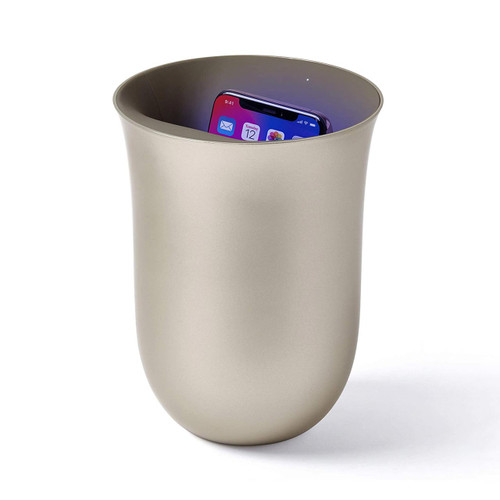 Lexon Oblio Gold UV-C sanitising station and wireless phone charger in a minimalist vase design.