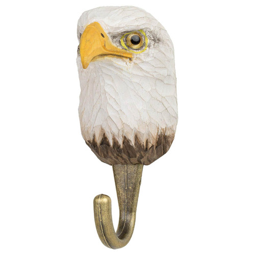 Three-quarter view of a hand-painted Bald Eagle wooden hook, highlighting the artisanal textural details of the feathers and the regal expression.