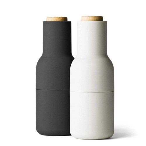 AUDO (ex Menu) Bottle Grinder Set — carbon and ash with beechwood lid, side-by-side product shot.