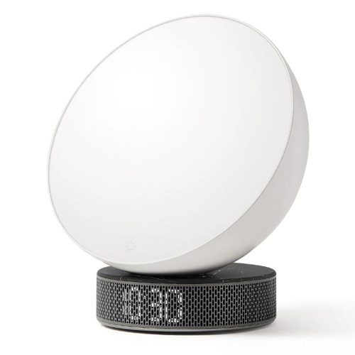 Front view of the Lexon Miami Sunrise Alarm Clock in black marble, showing the clock face illuminated and the time "10:30" on its base. Shop it at the design gift shop.