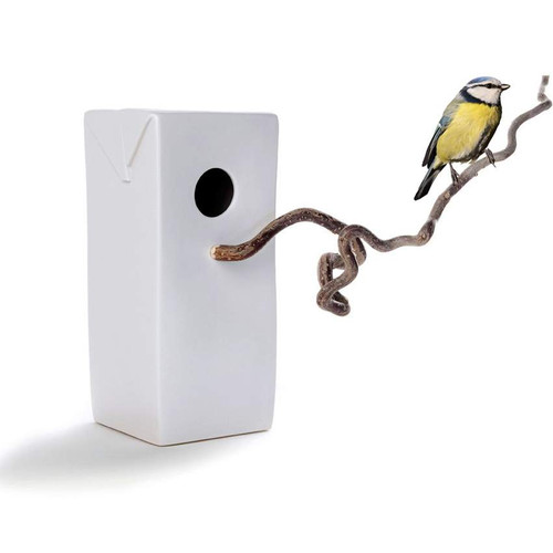 MENSCHMADE "Bird's Palace" ceramic bird house resembling a Tetra milk pack and a hazelnut twig as bird seat and a blue tit