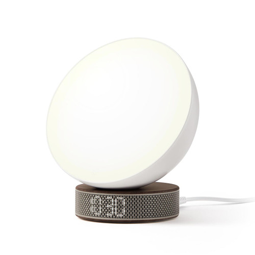Front view of the Lexon Miami Sunrise Alarm Clock in walnut finish (LR146DWD) , showing the clock face and sunlight illuminated and the time "10:30" on its base. Shop it at the design gift shop.
