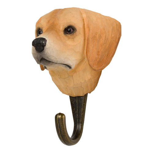 Three-quarter view of a carved wooden dog hook shaped like a Golden Retriever head.