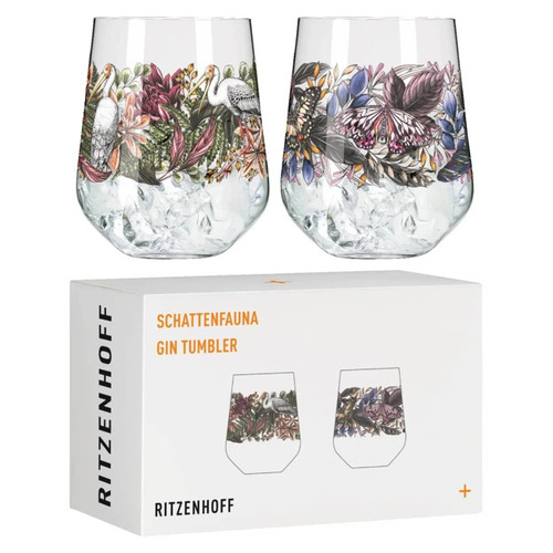 A Ritzenhoff Shadow Fauna Gin Tumbler set, featuring one tumbler with a pelican design and another with a butterfly, both by Maggie Enterrios. Shop it at the design gift shop.