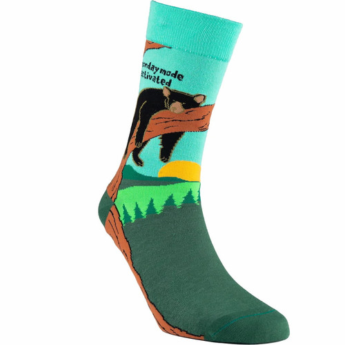 SEXY SOCKS Monday Mode Activated bamboo sock displaying a lazy bear draped over a tree branch under a mint green sky.