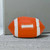 Annabel Trends Football Rugby Ball Doorstop in orange | The Design Gift Shop