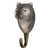 Three-quarter view of a hand-painted Wombat wooden hook, highlighting the intelligent eye detail and artisanal wood grain finish.