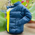 Navy Blue Drink Holder Puffer Jacket by COATIE (side) | the design gift shop