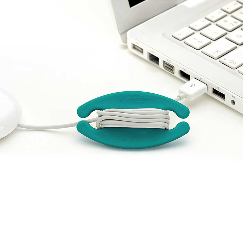 Bobino cord wrap cable organiser medium size, colour Emerald, with laptop