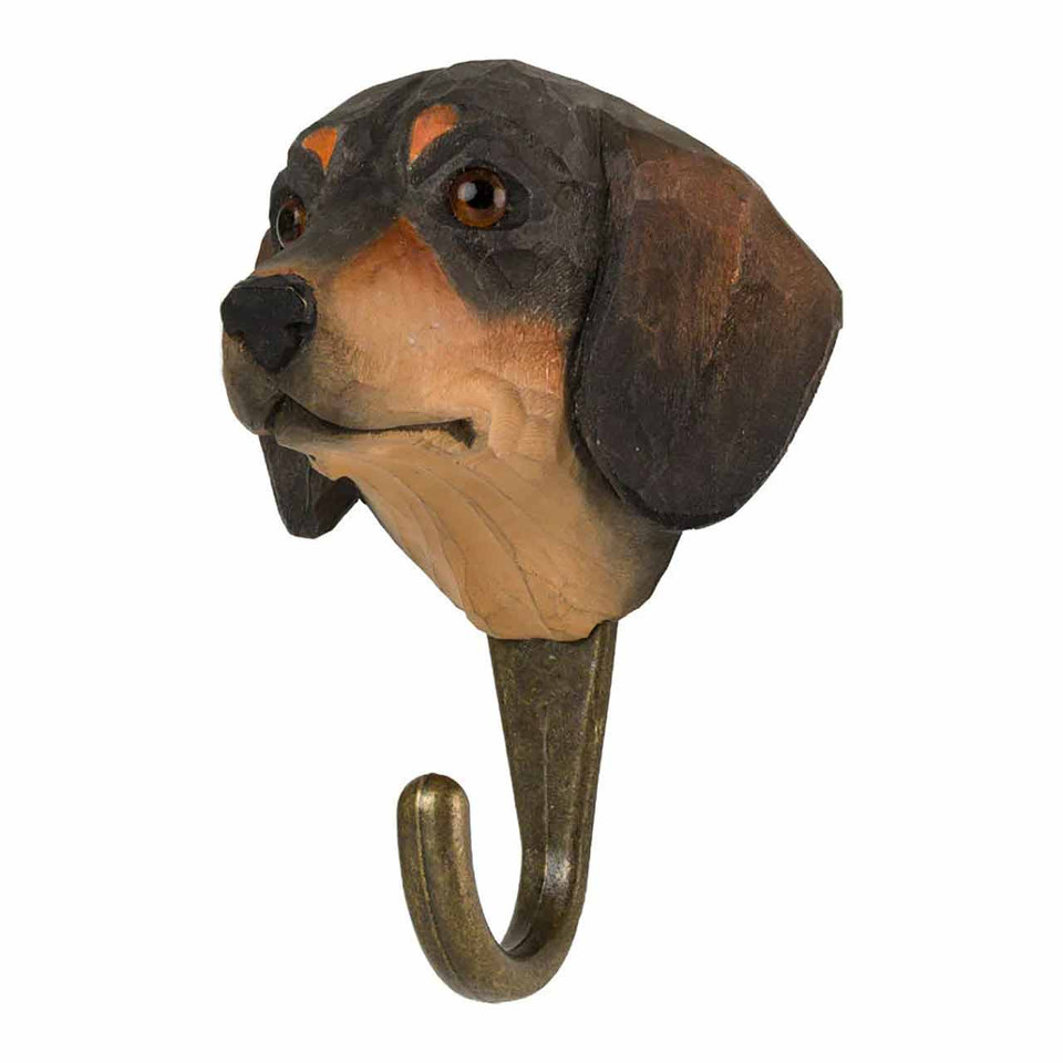 Three-quarter view of a carved wooden Sausage Dog wall hook with a sturdy bronze-finish metal hook.