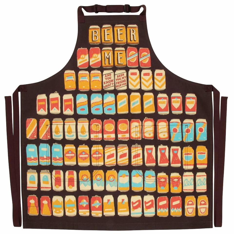 Blue Q Beer Me apron featuring a colourful grid print of retro beer cans on a dark background.