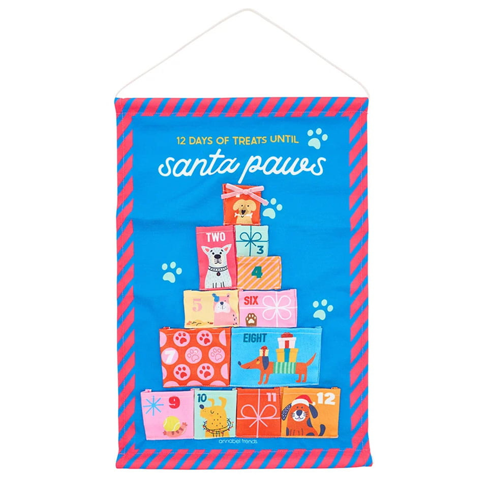 Annabel Trends Santa Paws 12-pocket reusable fabric advent calendar displaying 12 numbered dog-themed pockets arranged like a Christmas tree on a blue background.