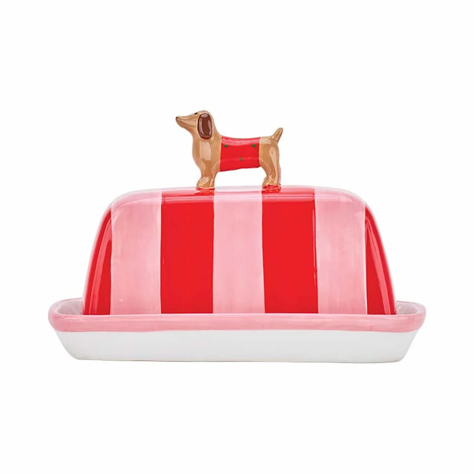 Annabel Trends ceramic Dachshund butter dish featuring a red-and-white striped base and lid, topped with a sculptural sausage-dog handle.