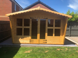 12x8 summerhouse 2ft roof overhang & tapered sides, long window double doors