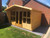 12x8 summerhouse 2ft roof overhang & tapered sides, long window double doors